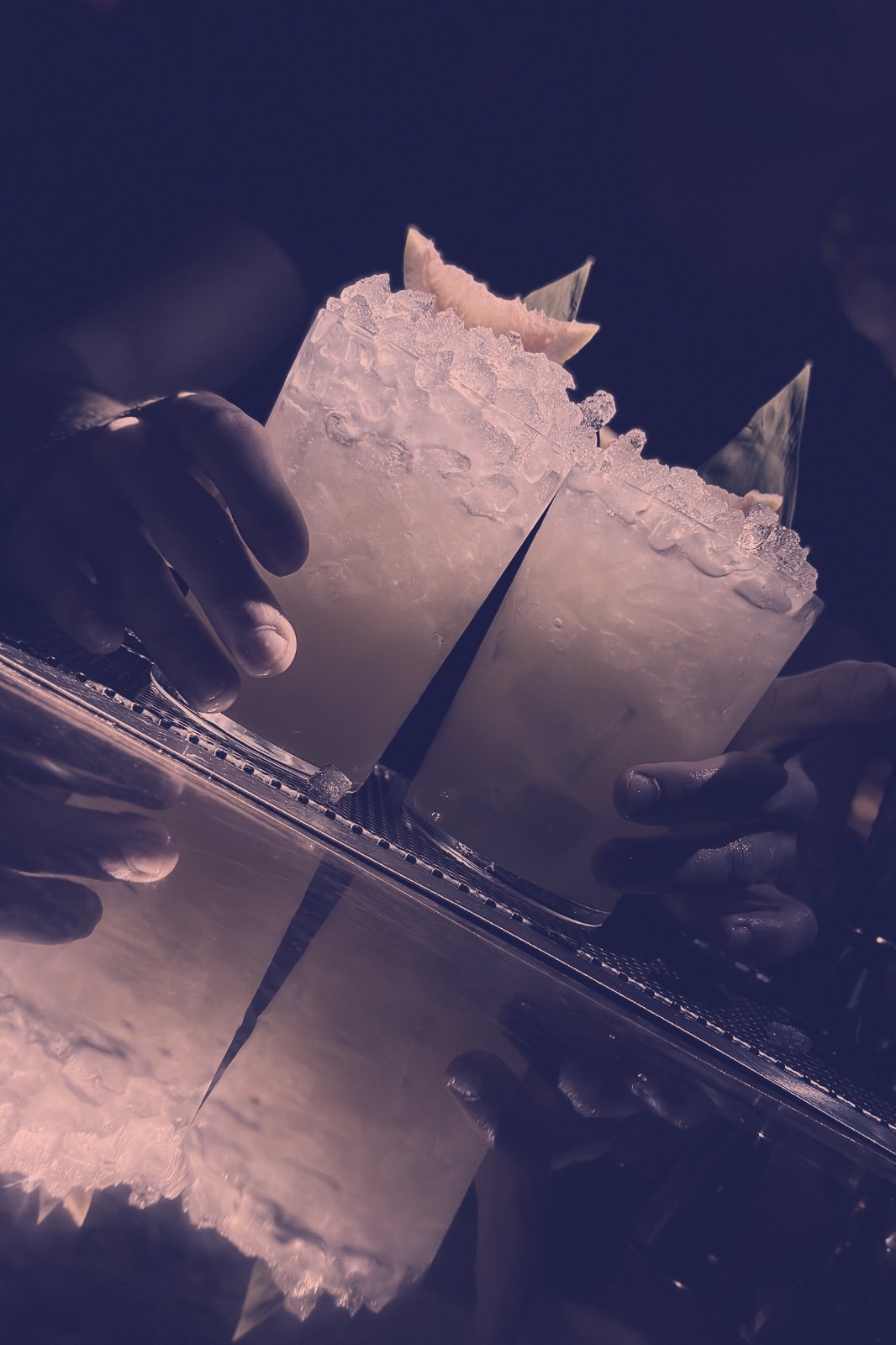 two cocktails with crushed ice